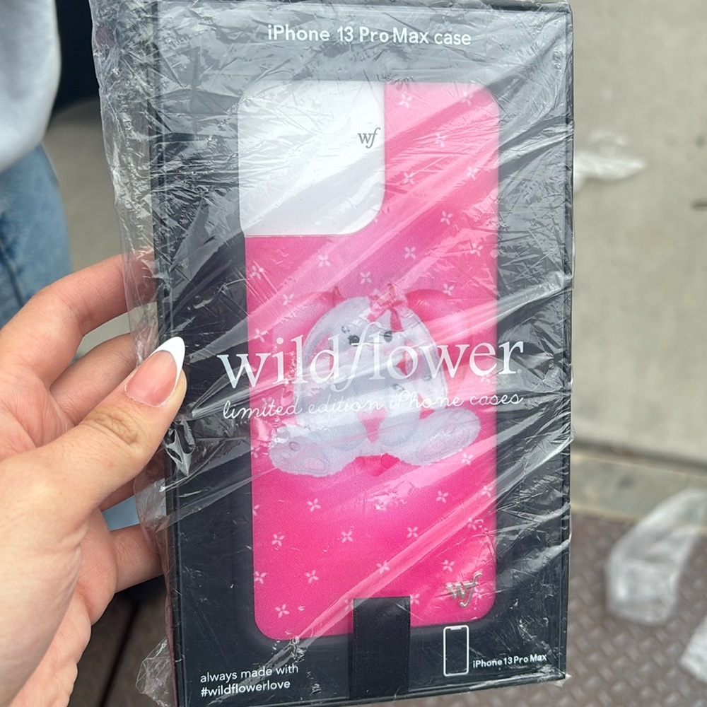 I phone 13 Pro Max case. Wildflower cases. Never used. Still in packaging.